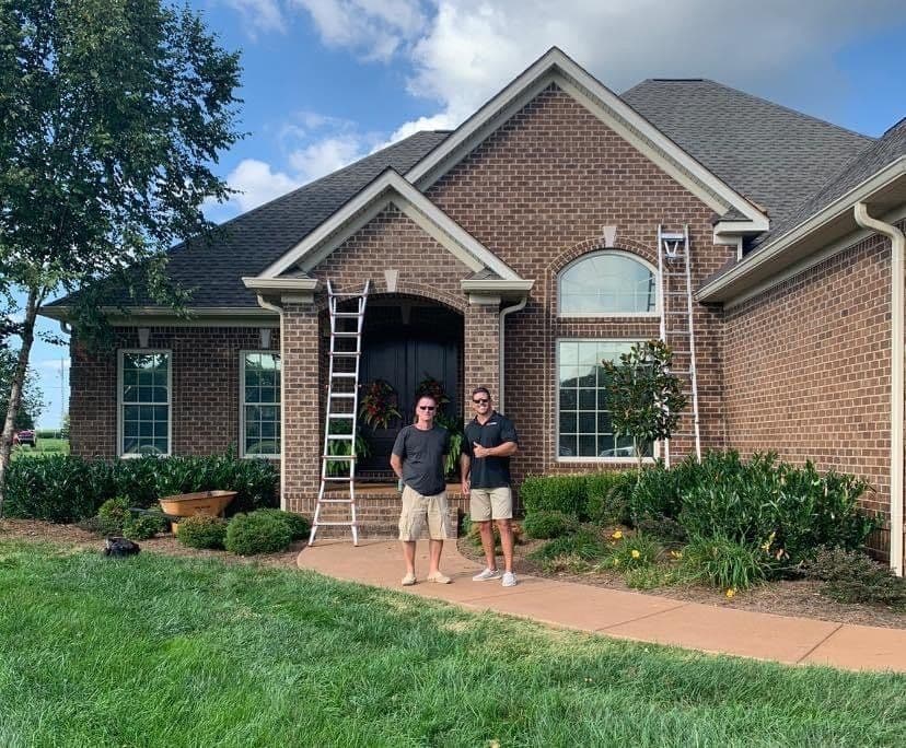 Brick home after roof replacement