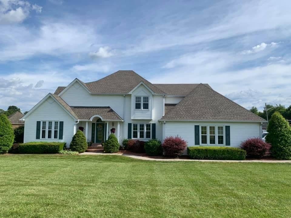 Two-story home with a new roof